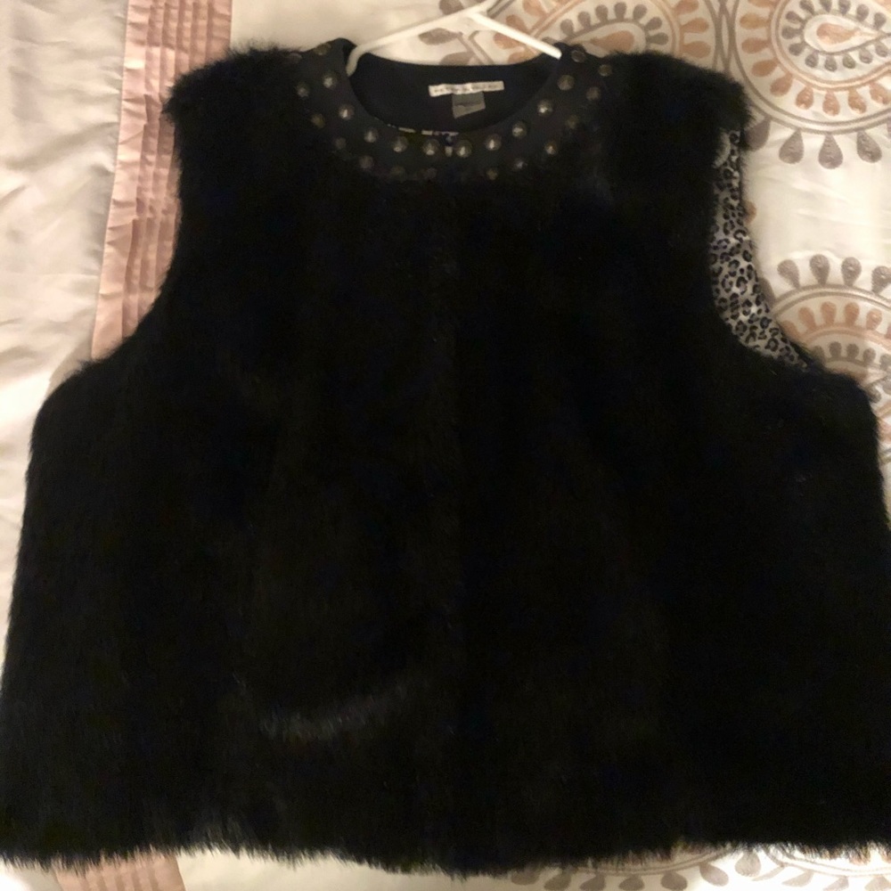 Black faux fur lined vest. Size XL. Worn 1x.